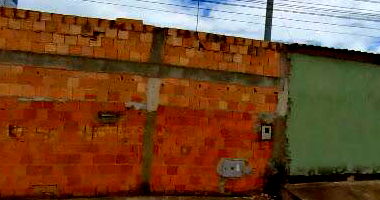 Casa com 2 quartos, varanda, área construída 61,42m², 1 vaga