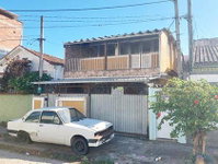 Casa Ocupada com 251m² de Área Construída
