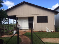 Casa de madeira com 50m² em lote de 336m², 1 quarto, 1 banheiro, ocupada