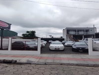 Terreno com 330m² e construção de 50m² em Sombrio