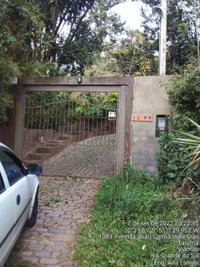 Casa de alto padrão com 166m² em terreno de 2.293m² em Viamão/RS