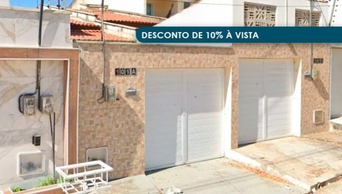 Casa geminada 70m² com fração ideal de terreno, imóvel ocupado