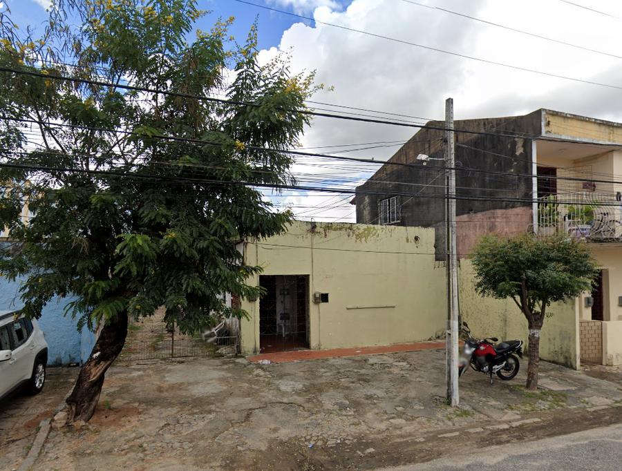 Prédio com área construída de 115 m², 473 m² terreno, ocupado