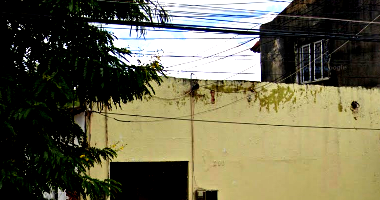Prédio com área construída de 115 m², 473 m² terreno, ocupado