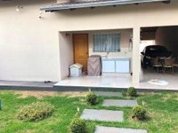 Casa com 3 quartos, 2 banheiros e 130m² construída, ocupada
