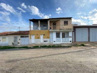 Casa padrão com 1 quarto e 1 banheiro, área construída 56,15m², ocupada