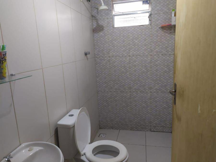 Casa Ocupada na Rua Olavo Bilac - 400m² de Terreno