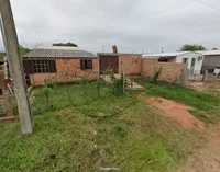 Terreno com casa de alvenaria, 300m², Jardim Paraíso