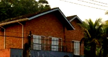 Terreno com sobrado em Guarujá - 567,83 m²