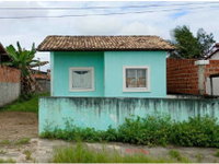 Casa com 40,05m² construídos, ocupada, em leilão