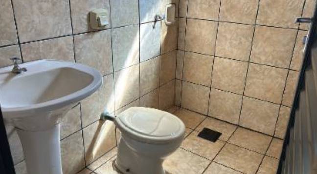 Casa com 3 quartos, 2 banheiros e 143m² construída, ocupada