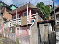 Casa Padrão Ocupada com 3 Dormitórios e 2 Banheiros