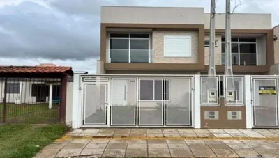 Casa ocupada com 108,79 m² e pátio privativo