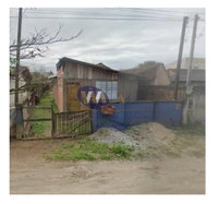 Lote Urbano com Casa de Madeira em Guaratuba/PR
