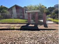 Casa Ocupada com 1 Vaga e Ampla Área em Três de Maio
