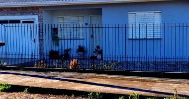 Lote Urbano com casa e galpão, 360m²