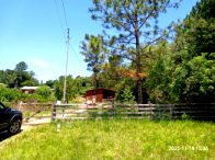 Casa de Madeira com Terreno Amplo em Eldorado do Sul