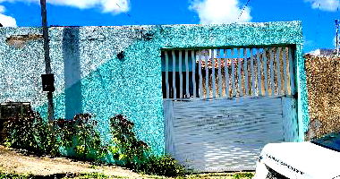 Casa com 2 quartos, varanda, área construída 58,52m², terreno 151,65m²