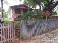 Casa de madeira com 481,80 m² em estado precário