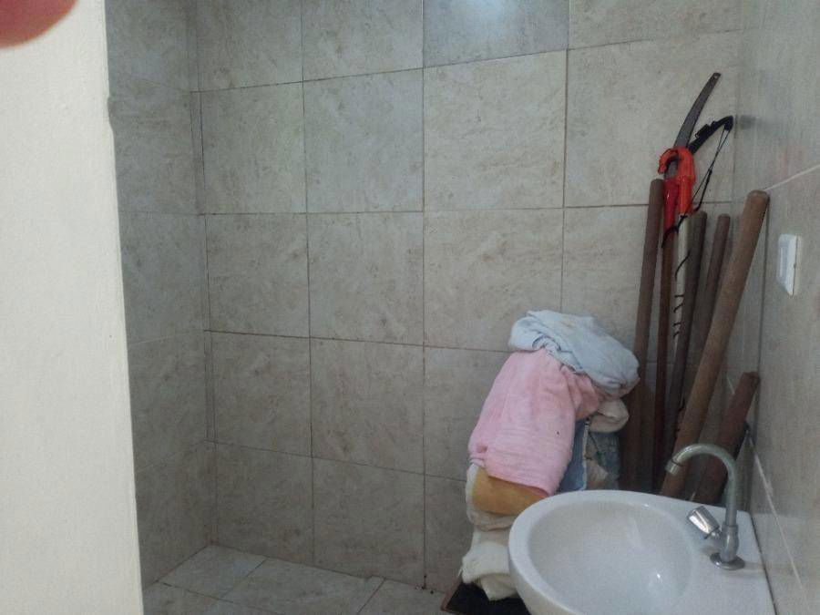 Casa com 3 quartos, 2 banheiros, 2 vagas, 276m² construída, ocupada