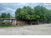Terreno com Casa de Madeira em Taquara