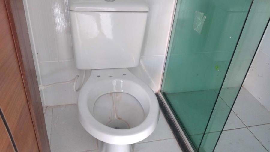Casa com 3 quartos, 2 banheiros e 84m² construída, ocupada