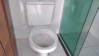 Casa com 3 quartos, 2 banheiros e 84m² construída, ocupada