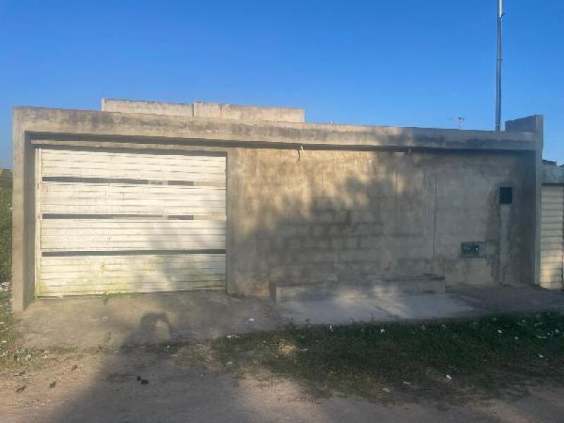 Casa com 1 quarto, 1 vaga e 60m² de área construída