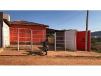 Casa padrão com varanda, 54m² construída, imóvel