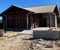 Terreno com casa mista em Jaguaruna, 375m², 110m² construídos
