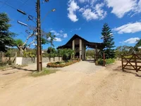 Casa em condomínio com 6 vagas e 712m² construída, imóvel
