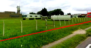 Terreno plano com 41.400m² e edificações, ótima localização