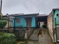 Casa com 1 vaga de garagem, 200m² de terreno, ocupada