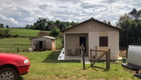 Casa com 2 quartos, 1 banheiro e 1 vaga de garagem, 81 m², ocupada