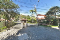 Casa em condomínio de alto padrão com 496m², 4 quartos, 3 banheiros e 2 vagas