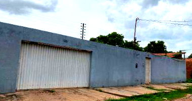 Casa com 3 quartos, 2 banheiros e 132m² construída, ocupada