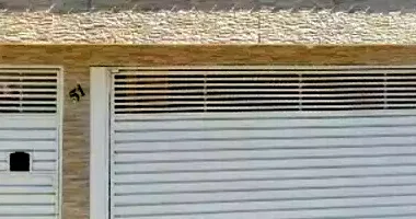 Casa com 128,52m² construídos, ocupada