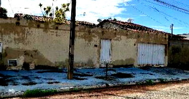 Casa com 3 quartos, 2 banheiros, área construída 195,61m², ocupada