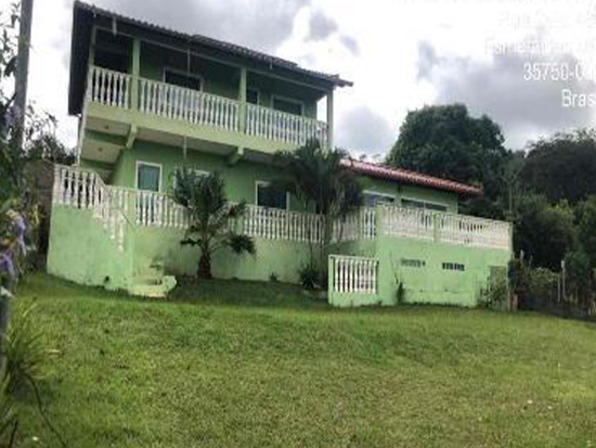 Casa Ocupada com 259m² Construídos e 1 Vaga