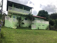Casa Ocupada com 259m² Construídos e 1 Vaga