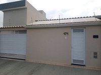 Casa padrão com 2 dormitórios e 1 vaga de garagem