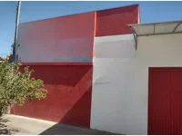 Casa padrão ocupada com 3 quartos, 2 banheiros e 1 vaga