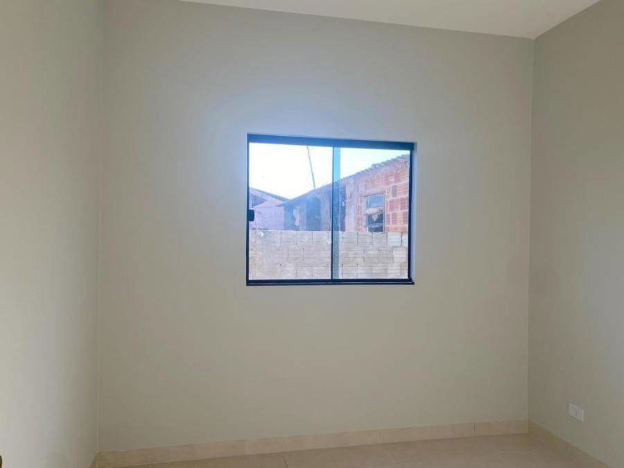 Casa com 3 quartos, 2 banheiros e 1 vaga, 90m² construída, ocupada