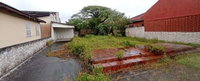 Terreno Urbano com Casa de Madeira em Pontal do Paraná