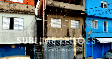 Terreno com 10 casas e 941m² de área construída