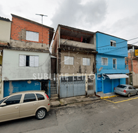 Terreno com 10 casas e 941m² de área construída