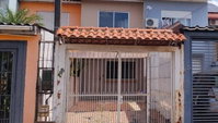 Casa ocupada de 2 quartos com 57 m² e 1 vaga