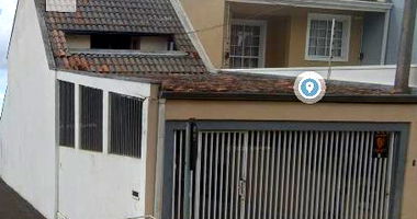 Terreno com sobrado em Curitiba - 100m²