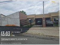 Casa ocupada com 1 vaga e 52,56 m² construídos