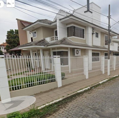 Duas Matrículas em Lages-SC: Residência e Edícula Ocupadas